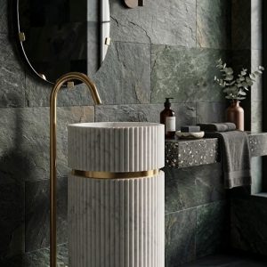 Muniq freestanding fluted white marble full column pedestal basin with 2 brushed gold rings and gold floor faucet in dark luxury bathroom
