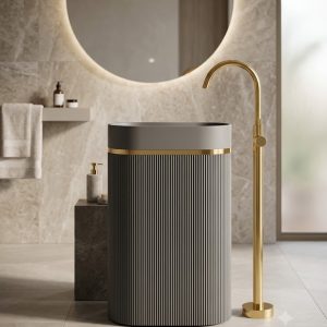 Muniq artificial stone pedestal basin 1342 600x375x850mm showing monochrome grey oval fluted column pedestal and bowl with precision gold ring accent wide format luxury washbasin