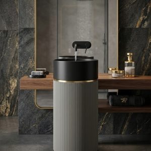 Muniq artificial stone pedestal basin 1325 450x850mm showing deep muted olive green fluted cylinder pedestal with matte black bowl and precision gold ring accent botanical luxury washbasin