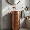 SS Door Rose Gold freestanding stainless steel pedestal basin with brushed rose gold PVD cylinder form and matching rose gold wall-mounted faucet in dark bathroom