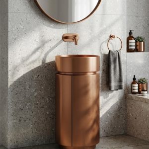 SS Door Rose Gold freestanding stainless steel pedestal basin with brushed rose gold PVD cylinder form and matching rose gold wall-mounted faucet in dark bathroom