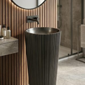 Matte black artificial stone freestanding tapered cone pedestal basin 1319 with fine vertical ribbed texture exterior and soft grey interior basin surface