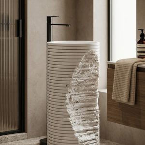 Close-up of exposed jagged fractured edge detail contrasting smooth ribbon texture on torn layered artificial stone freestanding pedestal basin 1336