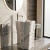 Muniq freestanding Statuario white marble ripple monolith pedestal basin with organic wave form in luxury bathroom with marble wall