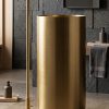 Aurum Gold freestanding stainless steel pedestal basin featuring a brushed gold metallic finish and cylindrical design paired with a luxury gold floor-mounted faucet
