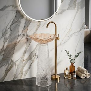 Rose gold textured glass pedestal freestanding basin featuring luxury rose gold crystal glass bowl and transparent textured glass column with brushed gold faucet
