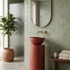 Muniq terracotta freestanding bowl basin 370x890mm custom pedestal sink full height view showing hemispherical bowl on tapered cylinder pedestal in warm rich terracotta red clay colour