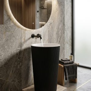 Matte black artificial stone freestanding tapered cone pedestal basin 1318 with fine vertical ribbed texture exterior and crisp white interior basin surface