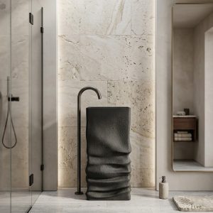 Textured layered black artificial stone freestanding square pedestal basin 1331 with sculpted stacked ridge lower body in matte black finish and bronze floor faucet