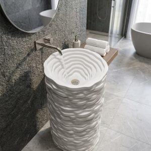 Canyon Pearl freestanding artificial stone pedestal basin featuring flowing layered contours and premium matte white finish inspired by natural stone formations