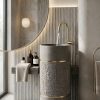 Grey terrazzo composite stone freestanding basin with textured center panel and dual gold accent rings in a luxury bathroom.