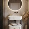 Luxury bathroom vanity featuring a marble-inspired composite stone basin, textured storage cabinet, and contemporary black metal frame.