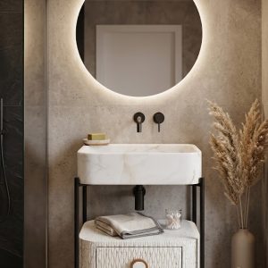 Luxury bathroom vanity featuring a marble-inspired composite stone basin, textured storage cabinet, and contemporary black metal frame.