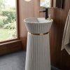 Ivory Crown freestanding artificial stone pedestal basin featuring a matte white finish, vertical fluted detailing, and elegant gold accent ring