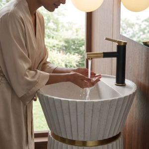 Close-up of vertical fluting on Ivory Crown pedestal basin showcasing architectural texture and premium craftsmanship