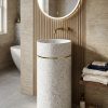 White terrazzo composite stone freestanding pedestal basin with elegant gold accent ring and modern cylindrical design