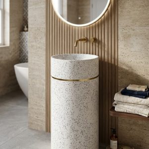 White terrazzo composite stone freestanding pedestal basin with elegant gold accent ring and modern cylindrical design