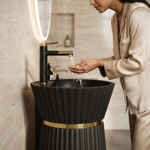 Close-up of vertical fluting on Noir Halo artificial stone pedestal basin showcasing architectural texture and premium craftsmanship