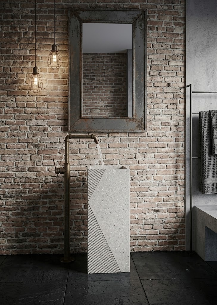 Rectangular composite stone freestanding basin featuring elegant geometric engraved detailing and contemporary architectural design.