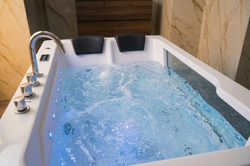 LED illuminated acrylic whirlpool bathtub with hydrotherapy system 04e44011 9439 4283 96a3 f31058be86fb - Luxury Glass Panel Jacuzzi Bathtub with LED Lighting & Hydro Massage Jets | Premium Acrylic Whirlpool Spa Tub