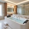 ccfd9221 b743 485b b6a0 71d1388efacf - Luxury Acrylic Whirlpool Jacuzzi Bathtub with Hydro Massage Jets | Freestanding Spa Tub for Modern Bathrooms